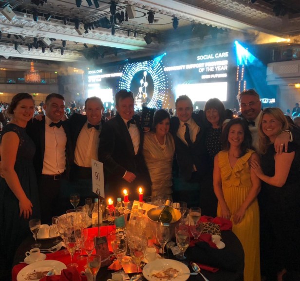 The New Care team celebrates its HealthInvestor award win